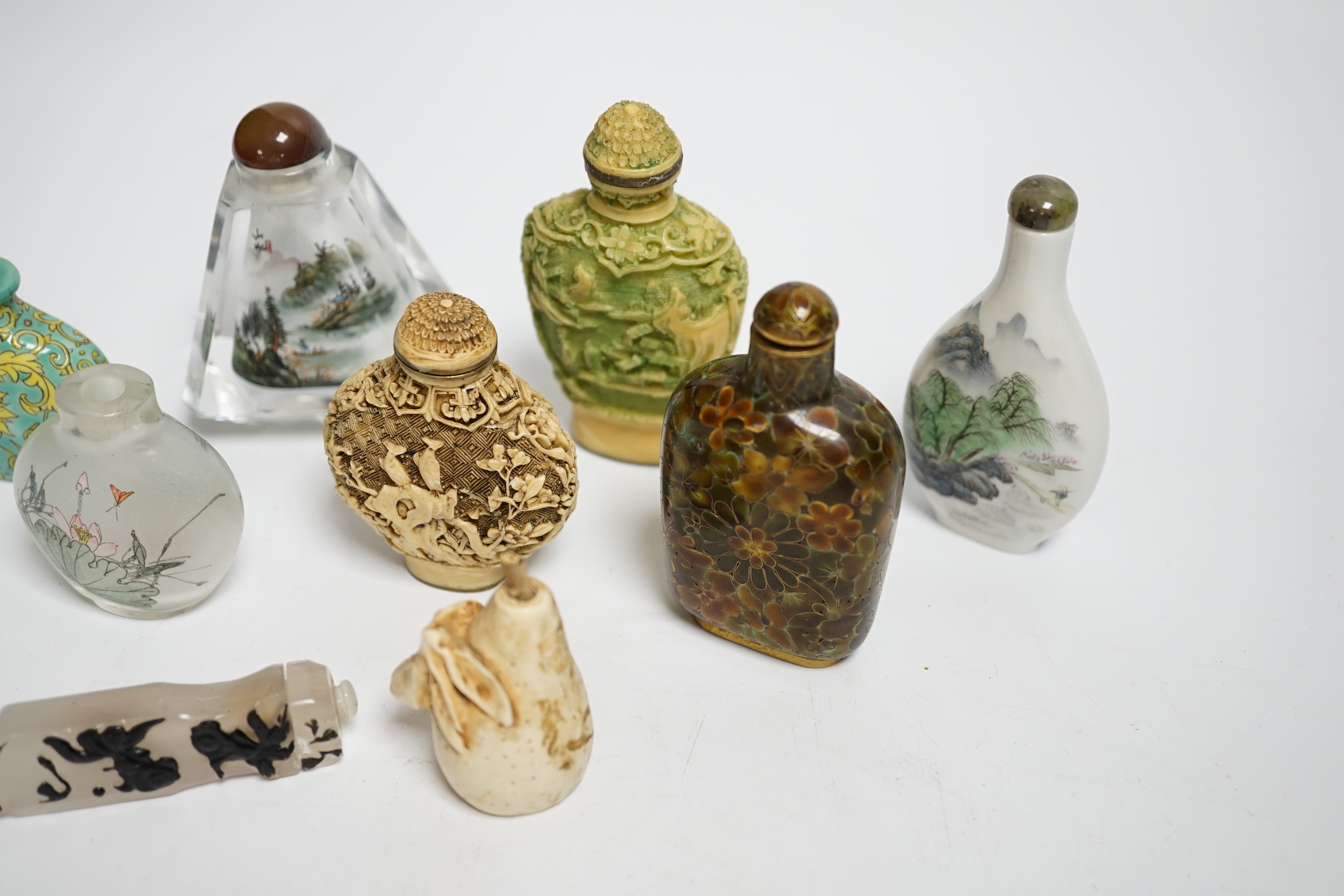 Nine various Chinese snuff bottles including porcelain, resin and glass, largest 8cm high